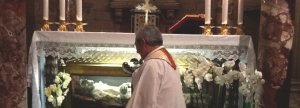 Fr. Peter praying at Tomb of St. Jude